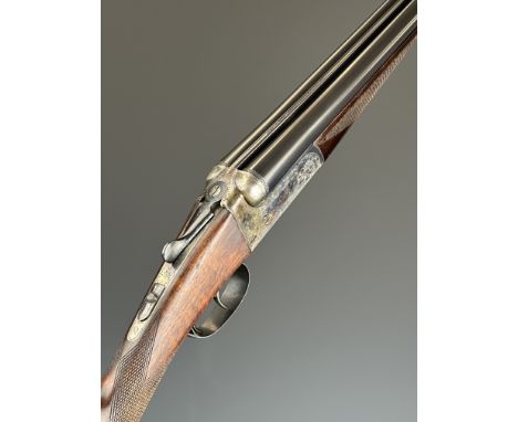AYA 28 bore side by side shotgun with named and engraved locks, border engraved underside and trigger guard, engraved top pla