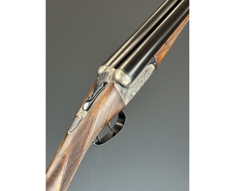 Webley &amp; Scott 12 bore side by side ejector shotgun with named and engraved locks, engraved underside, trigger guard, top