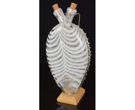 Nailsea glass double flask raised on a purpose built display stand, 24cm tall.