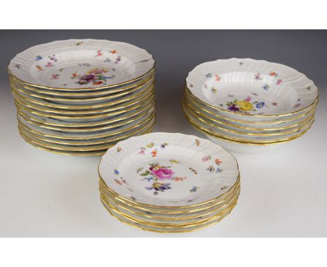 Meissen part dinner service with wrythen and relief moulded lattice / geometric border and decoration of flora and fauna, twe
