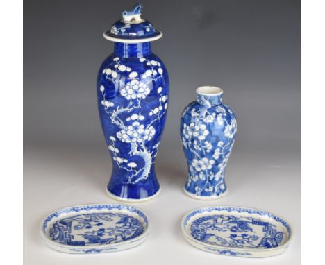 Two 19th / 20thC Chinese vases one covered, the smaller with four character mark to base and a pair of shallow dishes, one wi