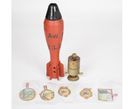 Inert mortar round with plastic cone body stencilled AW14 23.3.41, together with a Teller mine fuse marked RR-492.38 and four
