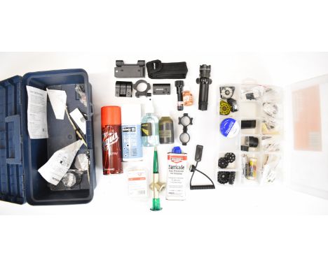 A collection of air rifle and gun parts and accessories including multi-shot rotary magazines, red dot holographic sight, Las