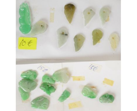 A collection of over 70 carved jade pendants and plaques including rabbits, leaves, animals, fruit, dragon, etc, largest 4.2 