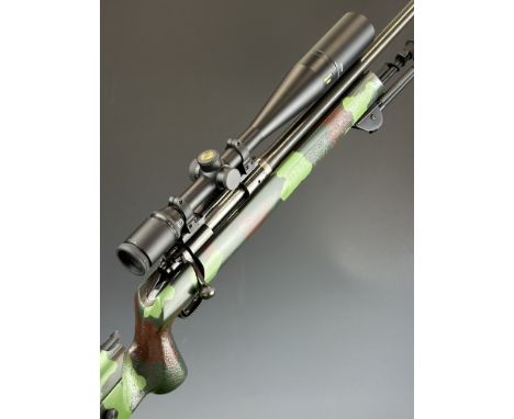 Winchester .308 bolt-action target rifle with textured semi-pistol grip, raised cheek piece, adjustable comb, bi-pod, Nikon M