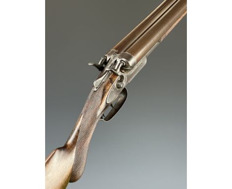 Remington 10 bore&nbsp;side by side hammer action shotgun with border engraved locks, trigger guard, underside, thumb lever a