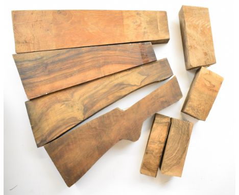 Eight figured walnut shotgun or rifle stock, forend and stock extension blanks, the stock blanks largest 50cm long.&nbsp;