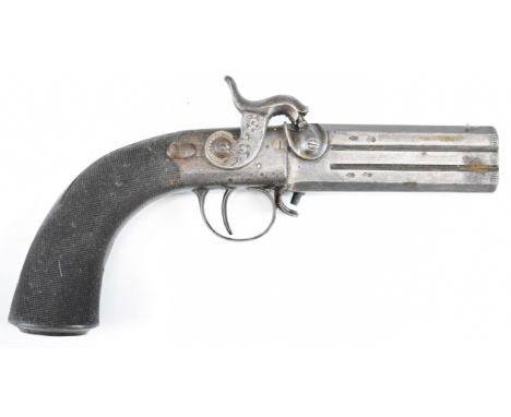 Thomas Woodward of London double barrelled over and under percussion hammer action belt pistol with scrolling engraving to th