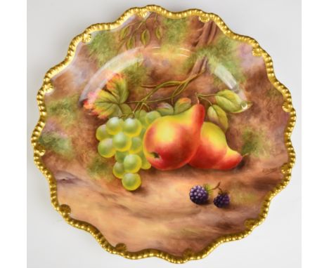 Royal Worcester painted fruit cabinet plate with gadrooned and gilded rim, signed Jones, diameter 22.5cm