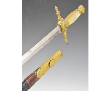 Continental sword with brass hilt, decorative dog heads to cross guard, 77cm double edged blade and scabbard.&nbsp;PLEASE NOT