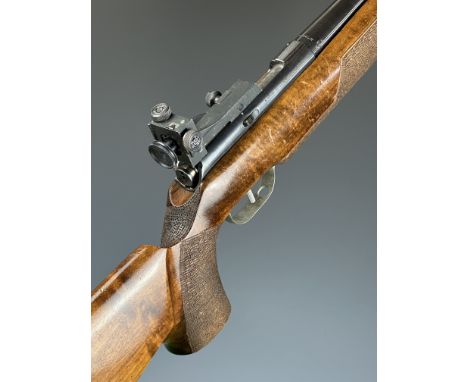 Unique Model 66 .22 left handed bolt-action target rifle with shaped and textured semi-pistol grip, adjustable trigger and bu