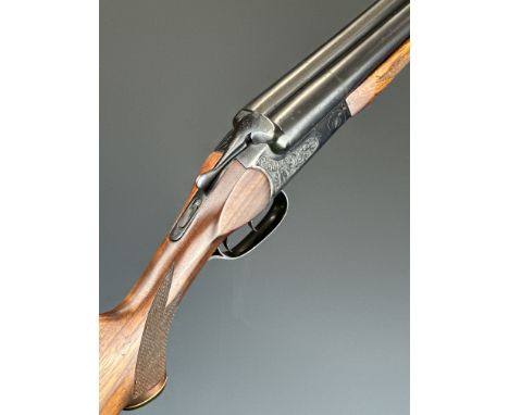 Baikal IJ-58 MAE 12 bore side by side shotgun with deep engraving of of a stag and deer to the locks, chequered semi-pistol g