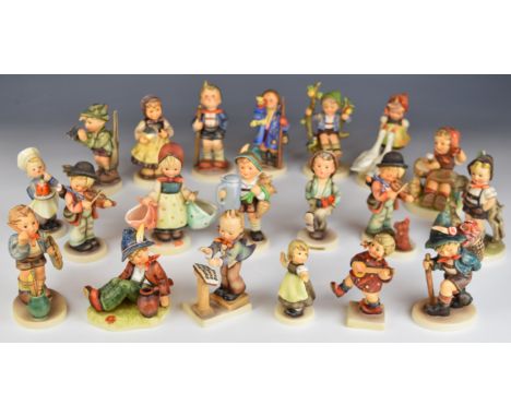 Twenty Goebel Hummel figures including Heartfelt Gift, Spring Waltz and Band Leader, tallest 15cm