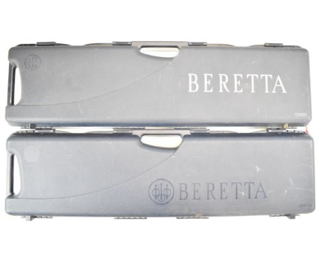 Two Beretta shotgun cases, both with fitted interiors for an over and under shotgun, each 96cm long.&nbsp;