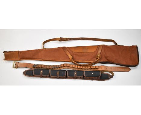 Leather and canvas shotgun or rifle slip together with two similar shotgun cartridge belts.&nbsp;