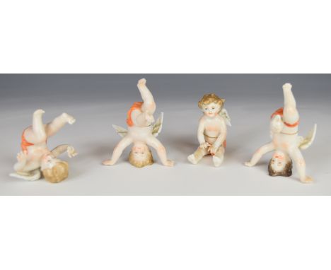 Four Volkstedt / Dresden porcelain cherub / putti figures, H6cm