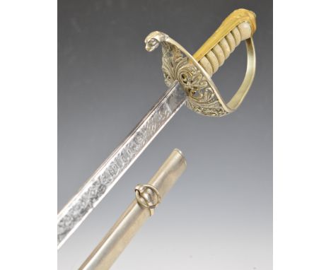 Spanish Toledo sword, the pierced guard having coat of arms with crown finial, shagreen handle, the 77cm blade having makers 
