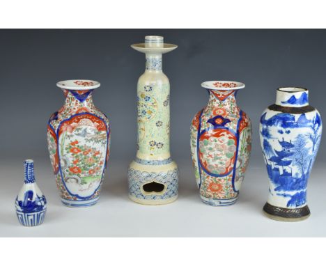 Collection of 19th/20thC Chinese and Japanese vases and a candlestick, tallest 30cm