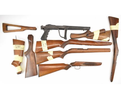 Nine various shotgun and rifle stocks including including a composite folding example for a Ruger 10/22, Savage 6A, J Gaucher