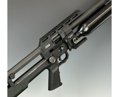 Reximex IXIA .22 PCP FAC carbine air rifle with textured pistol grip, composite skeleton stock, two 12 shot magazines, adjust