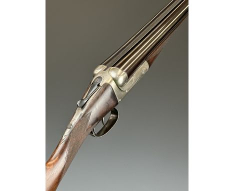 C S Rosson & Co 10 bore side by side shotgun with named locks, border engraved top plate, thumb lever, underside, fences and 