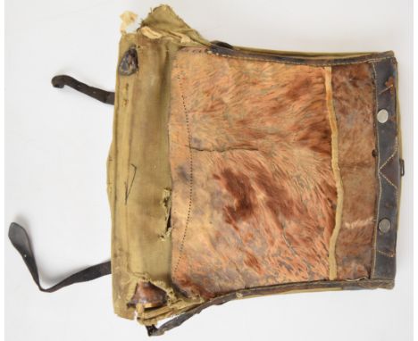 WW1 German canvas backpack with internal frame and cow hide cover to back and ink stamped 1915, width 32cm