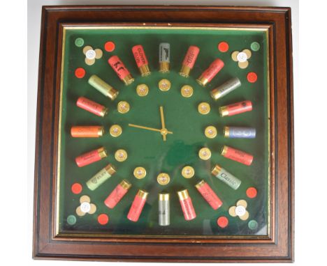 Shotgun cartridge shop or advertising display board in the form of a clock featuring Eley, E J Churchill, Clover Club, The We
