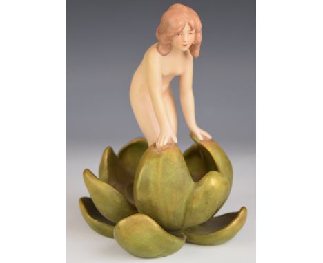 Royal Dux Art Nouveau / Art Deco figurine of a nude nymph emerging from a water lily, H16cm