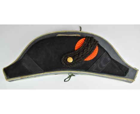 Dutch bicorn hat in black with orange rosette and gold button with floral decoration, L44cm, in original shaped box with labe