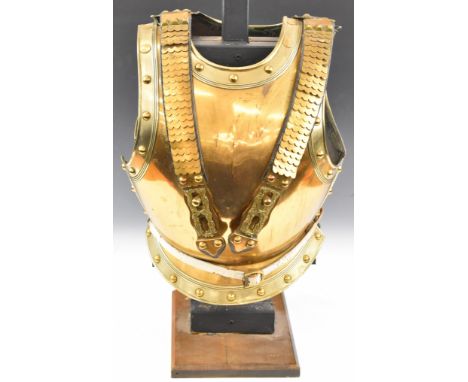 Imperial German Gardekorps cuirass armour having brass studded and leather and brass strap decoration, with lion masks to top