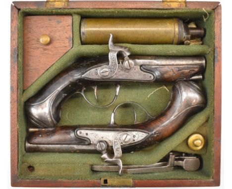 A pair of Queen Anne percussion converted from flintlock coat pistols, each with engraved and indistinctly named lock, hammer