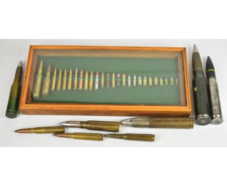 Collector of thirty four inert ammunition rounds of various calibres, including a glazed mounted display of twenty six, 48 x 