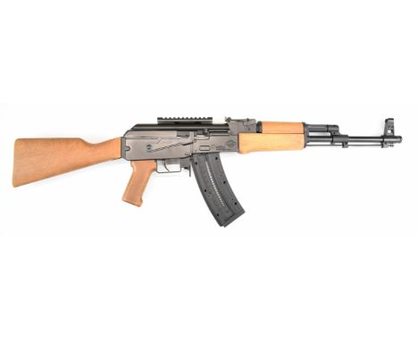 German Sport Guns (GSG) Kalashnikov AK47 .22 semi-automatic rifle with wooden pistol grip and stock, extended magazine, scope