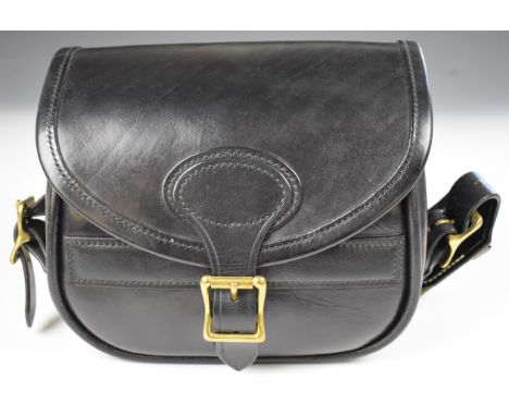 Leather shotgun cartridge bag with canvas strap.&nbsp;