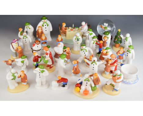 Twenty nine Coalport&nbsp;Raymond Briggs 'The Snowman' figures including Walking In The Air snow globe, Dinner For Two, I'll 