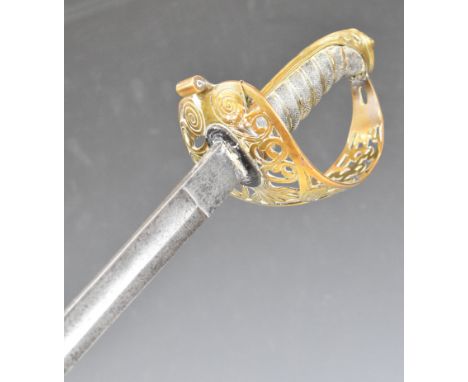 British 1821 style Cavalry officer's dress sword with brass hilt, shagreen and wire to grip and an 80cm decorated blade.&nbsp