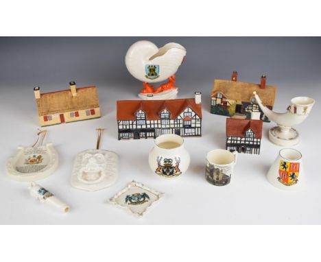 Goss houses, cottages and crested ware including Isle of Wight, Winchester, St Bees etc, tallest 16.5cm