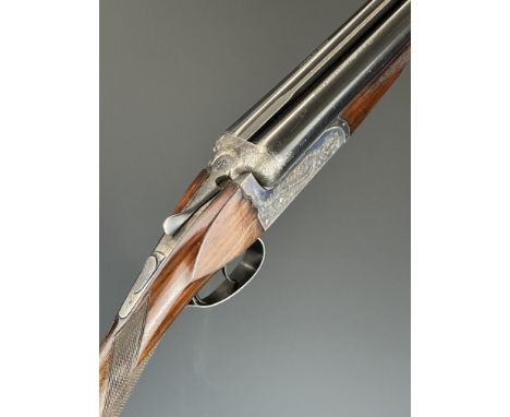 Victor Sarasquetta 12 bore side by side ejector shotgun with named and engraved locks, engraved underside, trigger guard, top