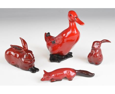 Four Royal Doulton flamb&eacute; animals comprising duck, lop eared rabbit, slinking fox and hare, tallest 14.5cm