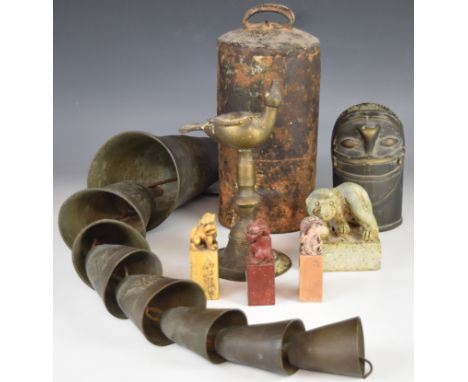Chinese / Tibetan brass / bronze bells, mask finial, figural seals etc, tallest 60cm