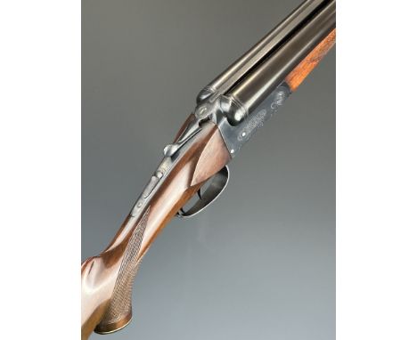 Hunter 12 bore&nbsp;side by side shotgun with engraved locks, underside, trigger guard, top plate and thumb lever, chequered 