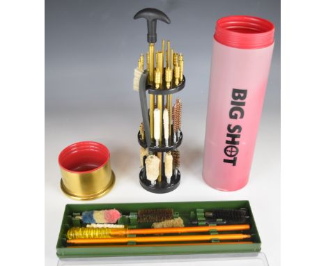 Two shotgun or rifle cleaning kits comprising Big Shot with case in the form of a shot gun cartridge and Aguinaga.&nbsp;