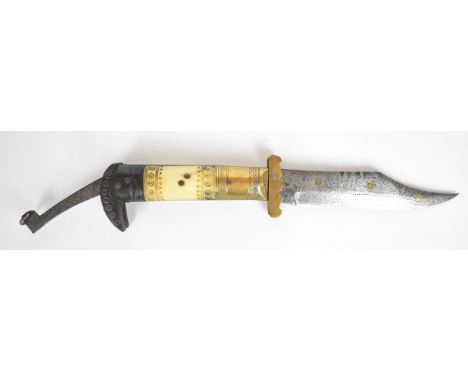 Spanish Navaja folding knife with engraved brass and carved bone grips and 15cm curved blade.&nbsp;PLEASE NOTE: WE ARE NOT AB