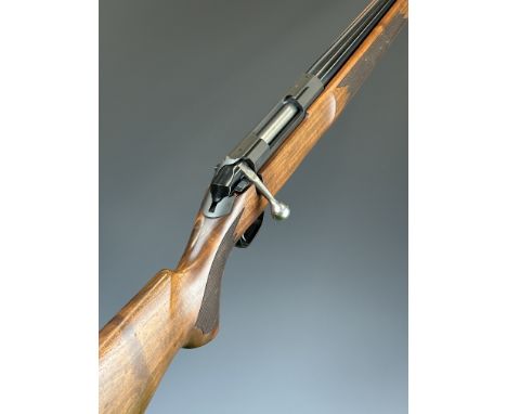 Tikka M595 .222 Remington bolt-action rifle with&nbsp;chequered semi-pistol grip and forend, sling mounts and 24.5 inch barre