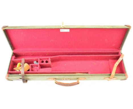 Two shotgun carry cases, one a Brady leather and canvas bound example with 'Brady Sporting Leather Goods made in Halesowen En