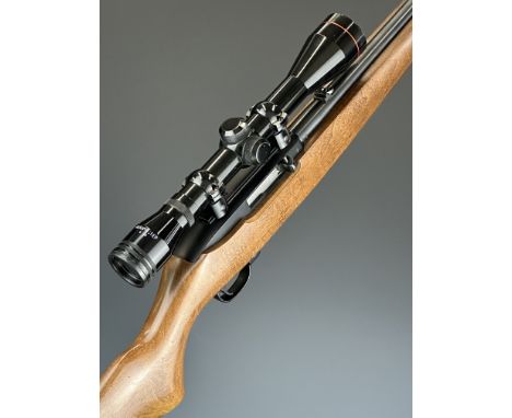 Ruger Model 10/22 .22 semi-automatic rifle with semi-pistol grip, multi-shot magazine, sling mounts, Bushmaster 4x40 scope, s