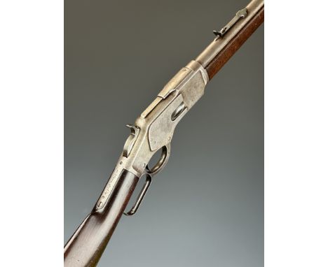 Winchester Model 1873 .44-40 underlever repeating carbine rifle with adjustable sights, steel butt plate and mounts, walnut s