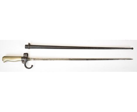 French 1886 pattern Lebel bayonet with down swept quillon, 52cm cruciform blade and scabbard.&nbsp;PLEASE NOTE: WE ARE NOT AB