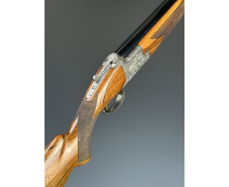 Browning B25 FCS Diana 12 bore over and under ejector shotgun with engraved scenes of birds to the locks and underside, engra