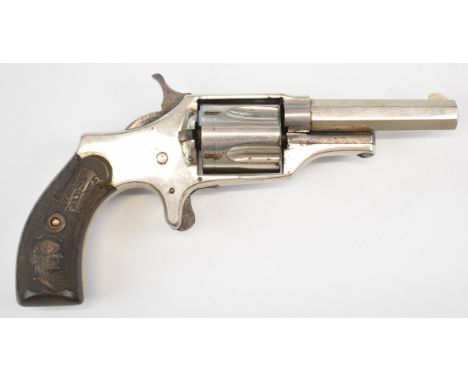 C S Shattuck Unique .32 rimfire five-shot single-action revolver with chequered composite grips decorated with the heads of A